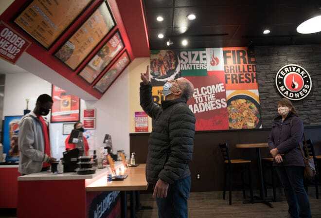 Customers place their orders at Teriyaki Madness in Marlton. 